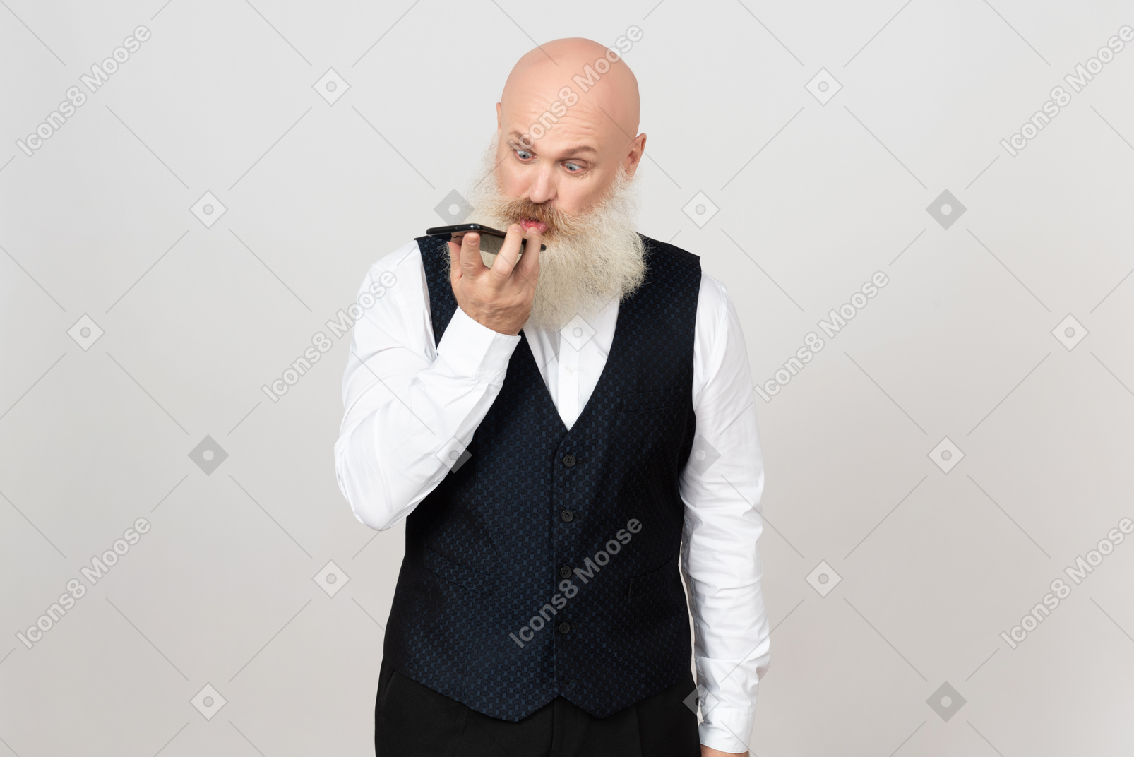 Aged good looking man saying something right to the phone