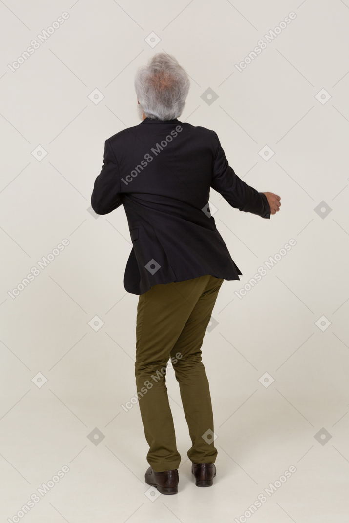 Back view of a man dancing