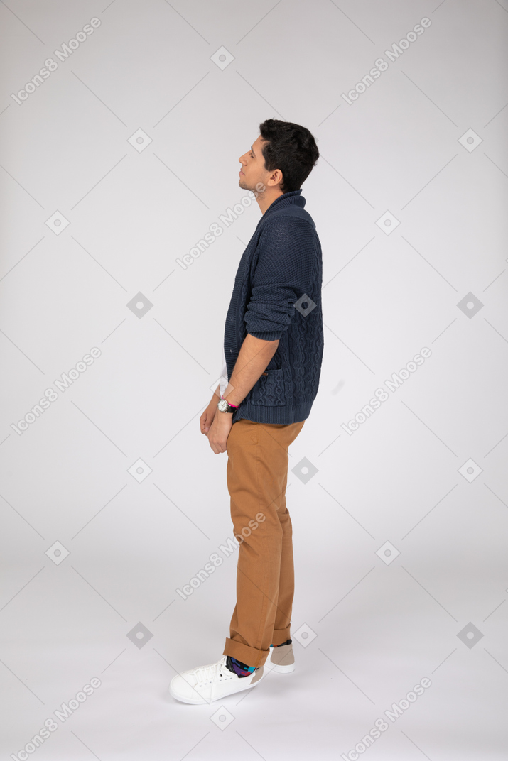 A man standing in front of a white background