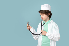 Attractive teenage in a doctor's outfit