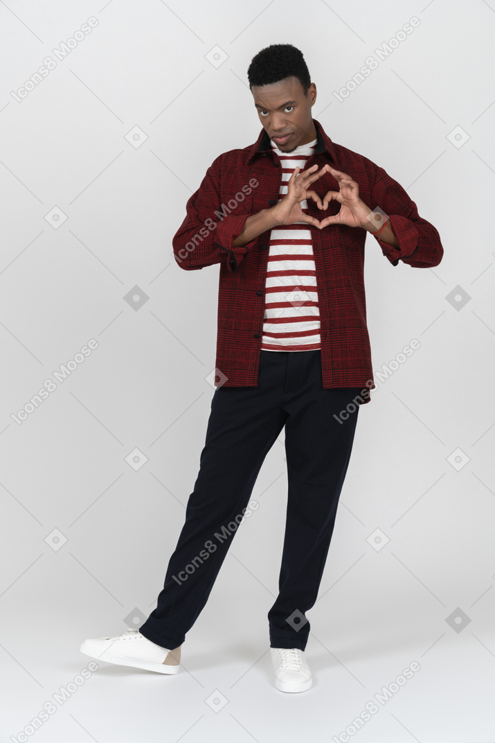 Front view of man showing love gesture