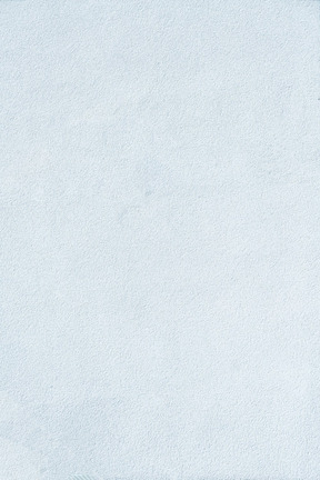A white wall with a white background