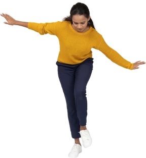 Front view of a girl in casual clothes bending down with outstretched arms