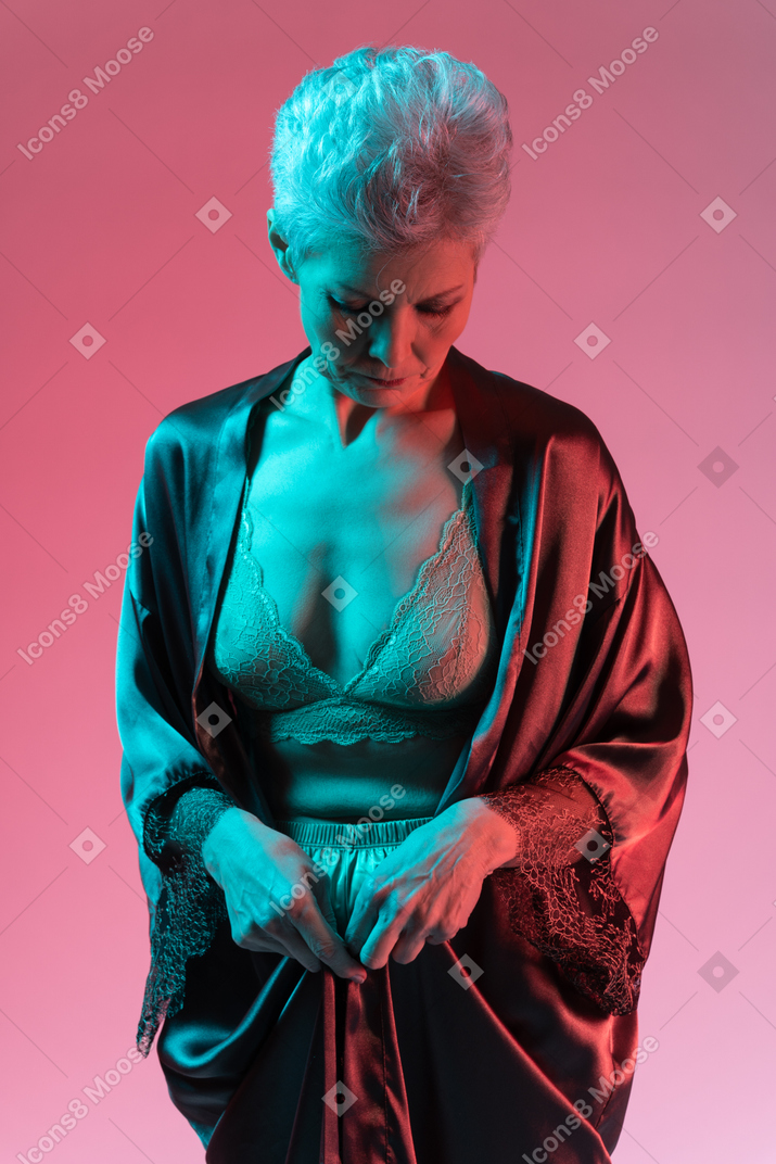 Portrait of a gorgeous mature lady in silk robe