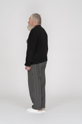 Rear view of standing old man