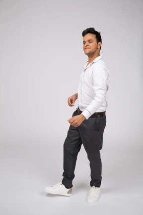 Man in white shirt walking