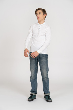 Young man in casual clothes standing