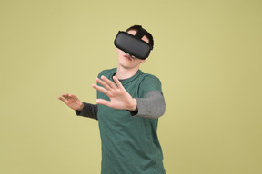 Man experiencing virtual reality using headset