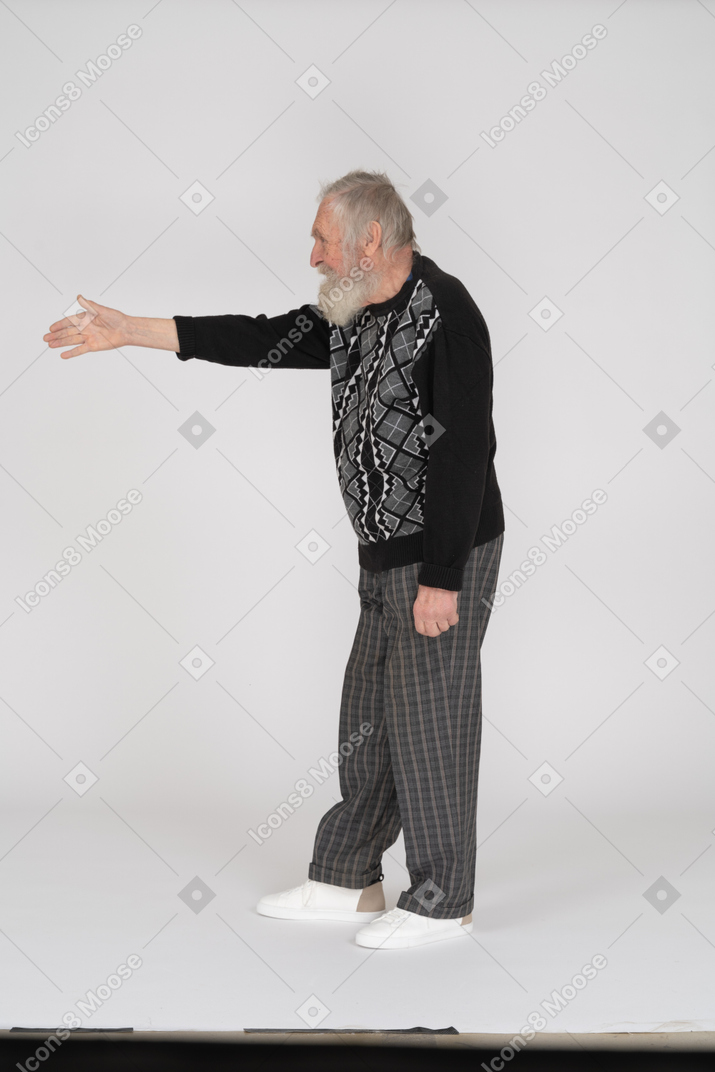 Side view of old man handshaking