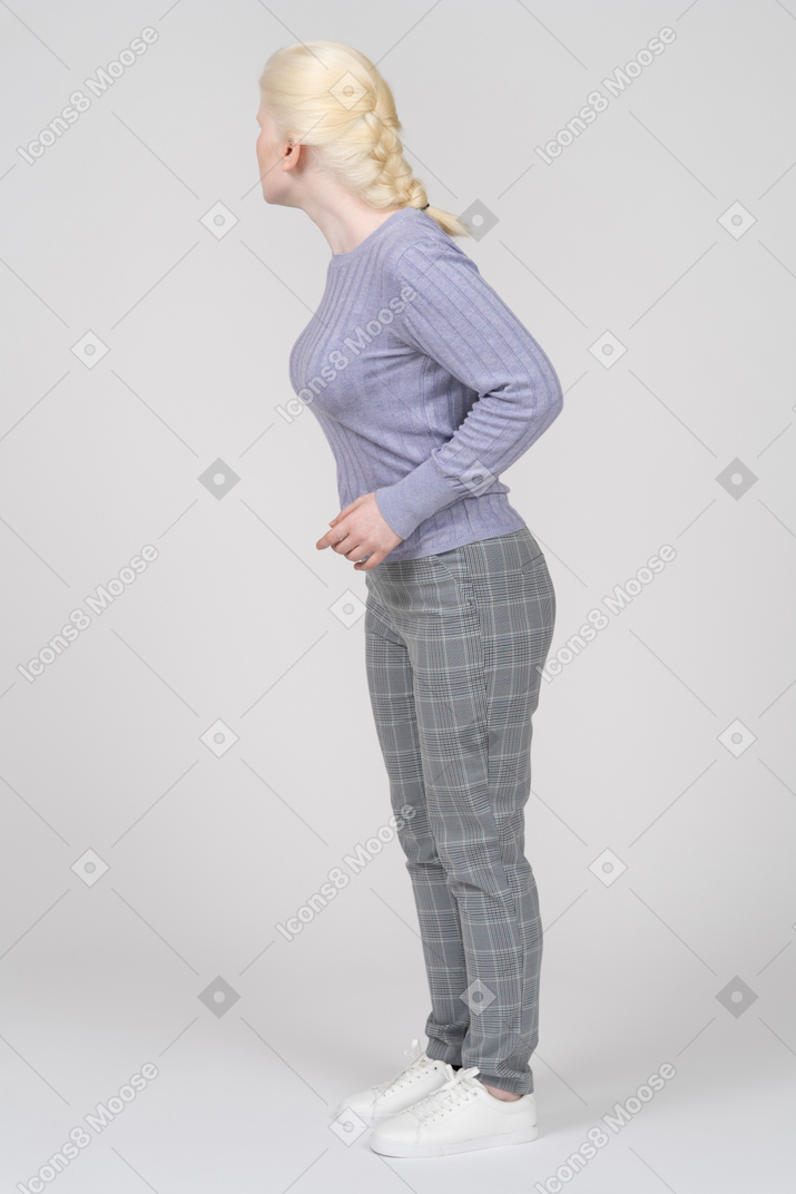 Young woman turning her head and looking away