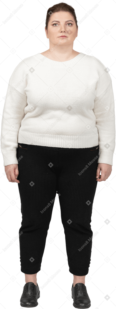 Plump woman in casual clothes standing