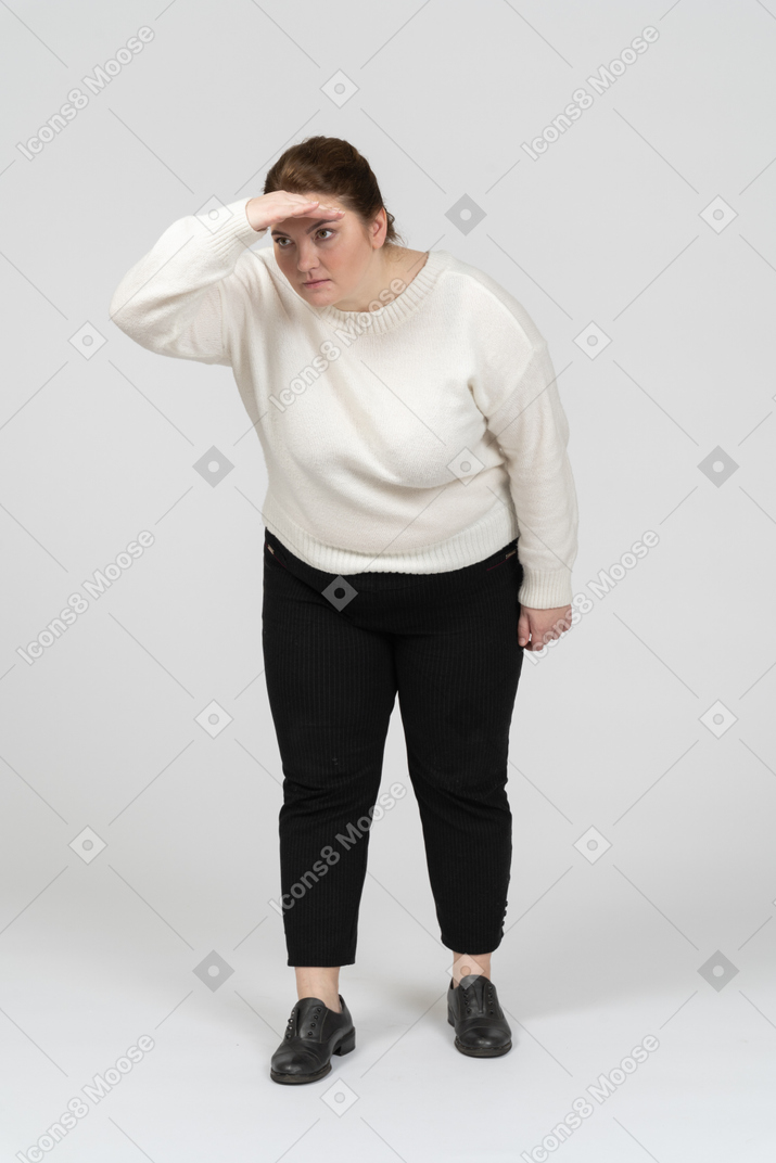 Front view of plus size woman looking for someone