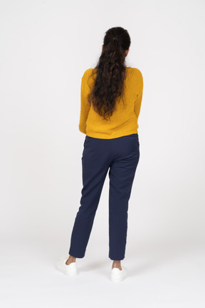 Back view of a girl in casual clothes