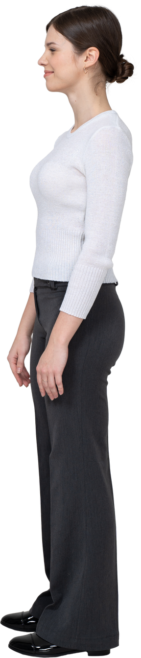 Side view of a suspicious young woman in office clothing