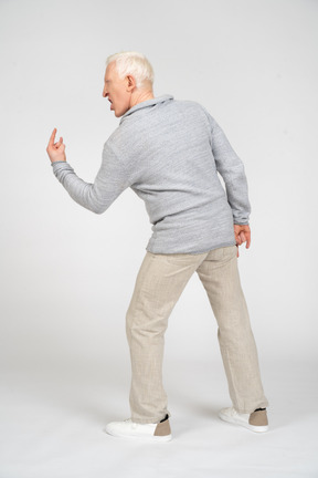 Man showing rock gesture