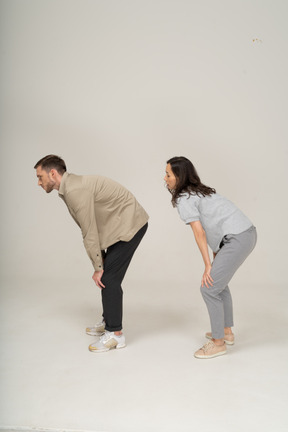 Tired young man and woman catching breath