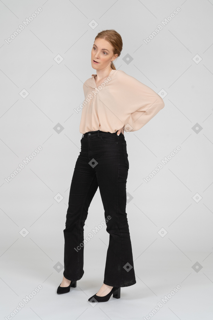 Woman in beautiful blouse standing