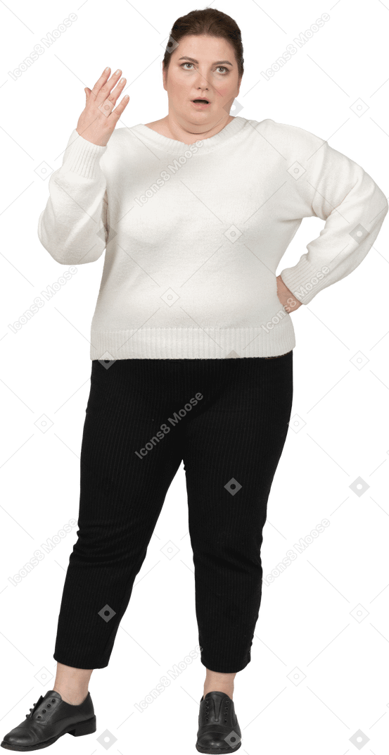 Unhappy plus size woman in casual clothes posing