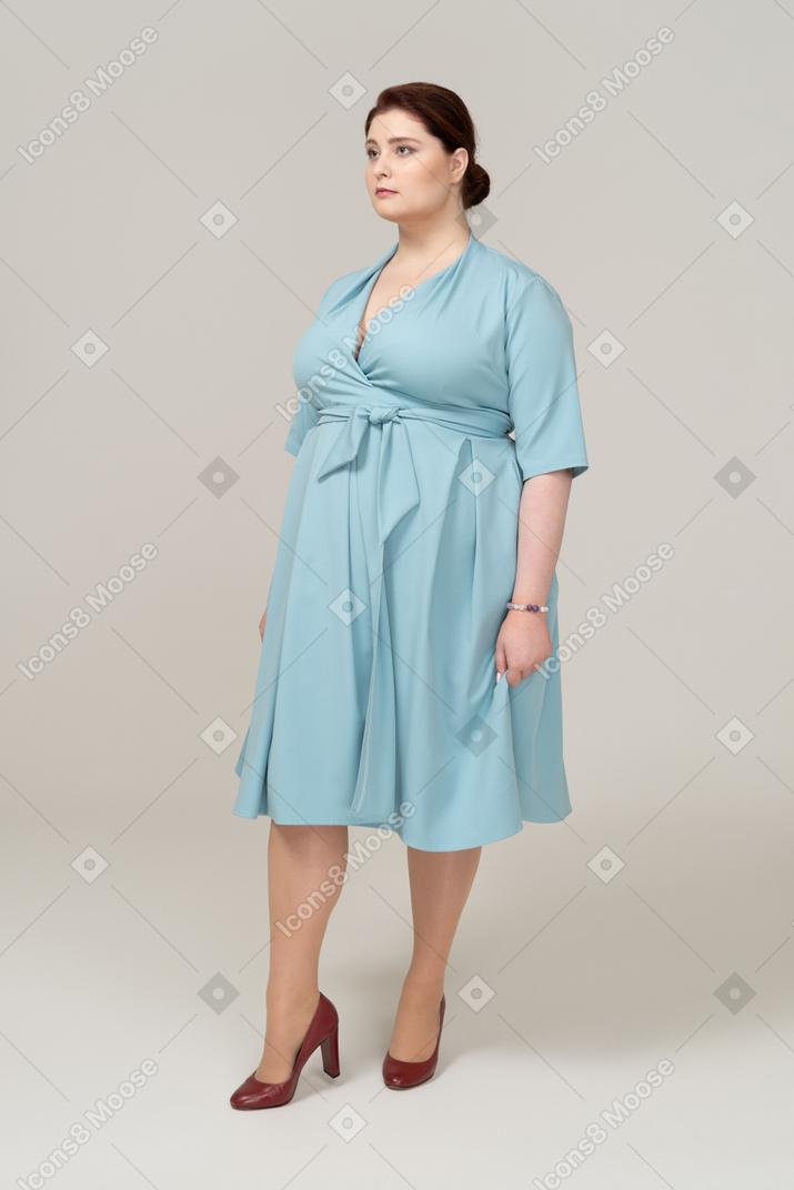 Front view of a woman in blue dress
