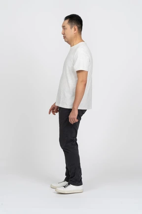 Side view of a confused man