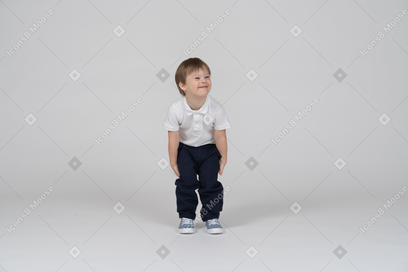 Cheerful boy leaning forward and looking aside