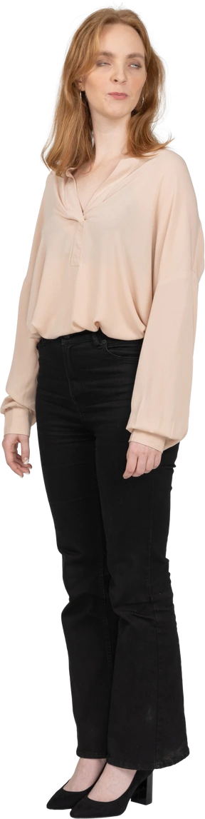 Woman in beautiful blouse standing