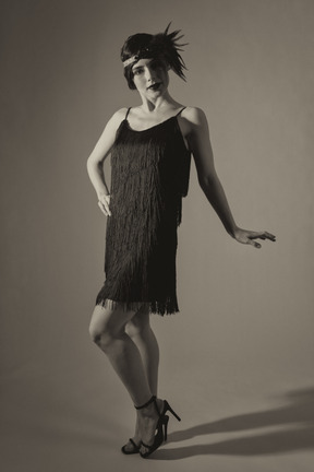 Full length black and white photo of an american flapper