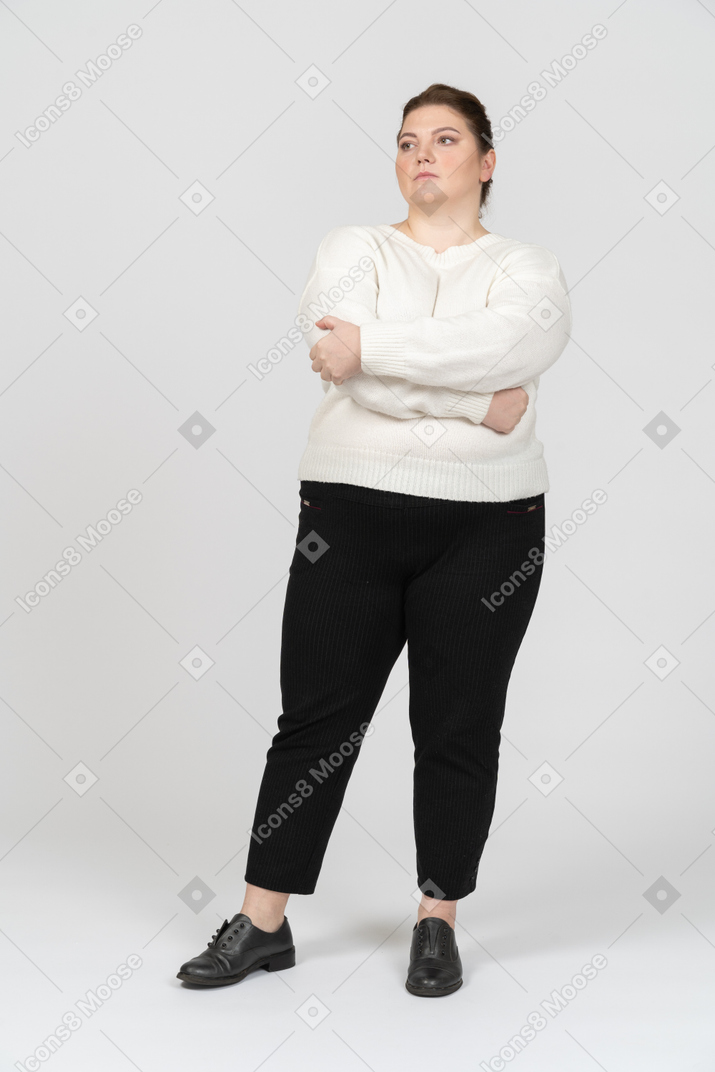 Confident plump woman in casual clothes