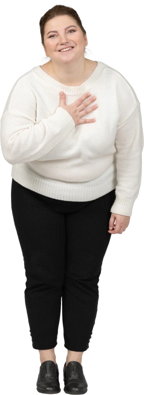 Front view of a happy plump woman in casual clothes