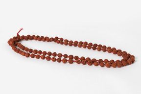 Mala beads on white background