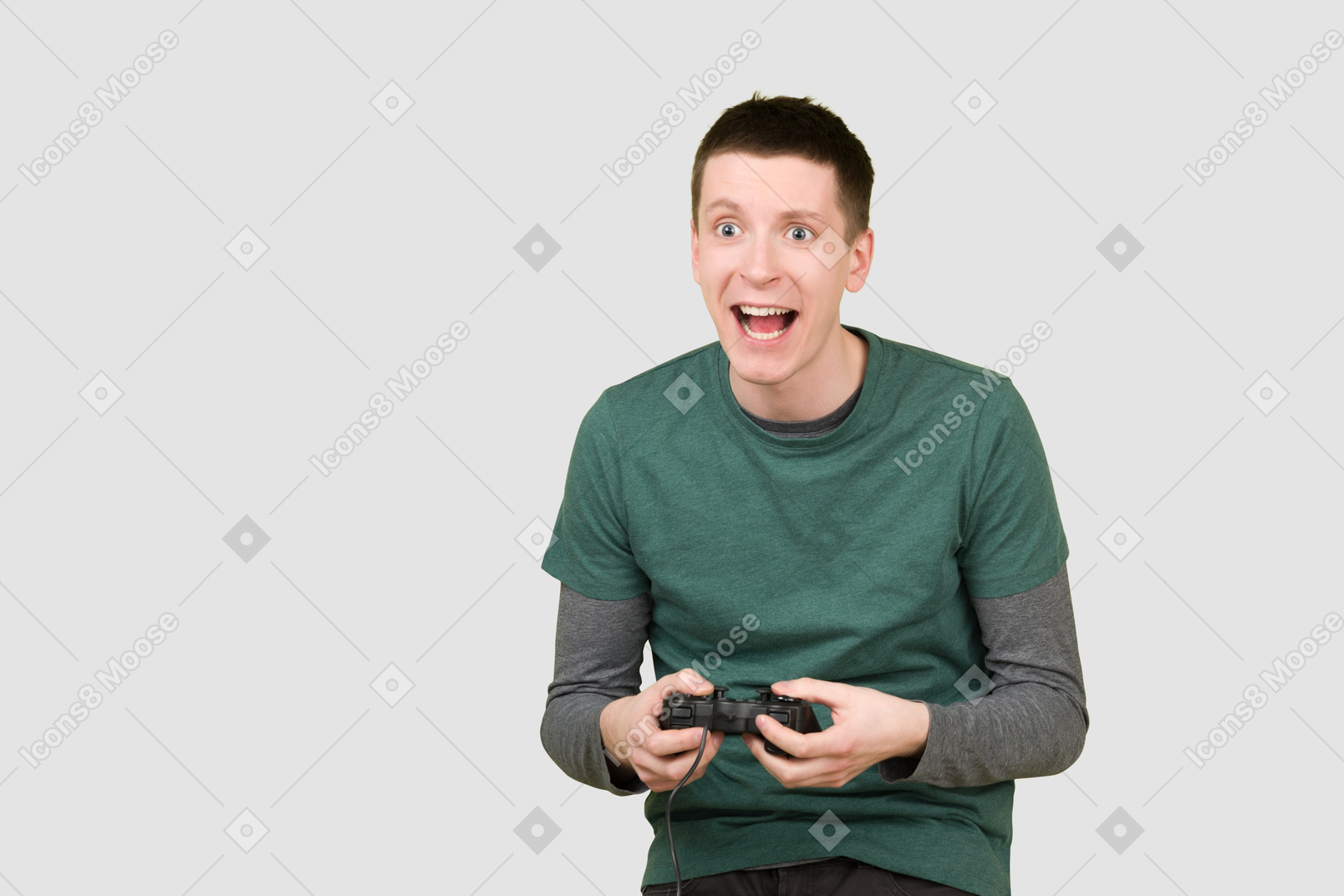 Emotional man playing a video game via gamepad