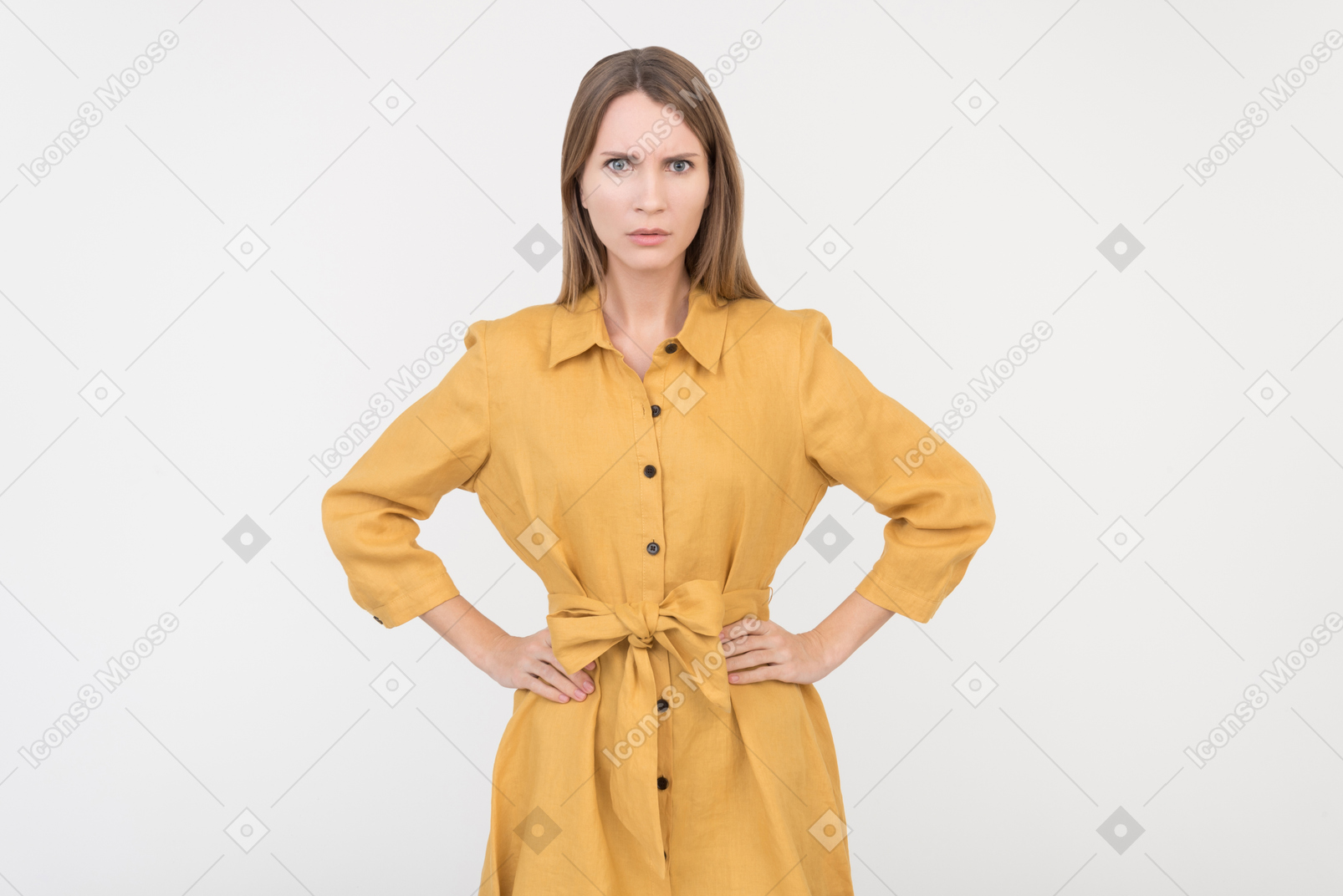 Mad young woman standing her hands on hips