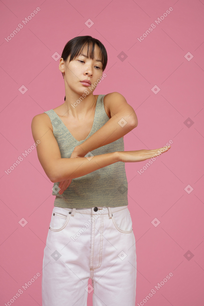 Young woman dancing with hands
