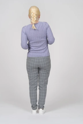 Back view of a woman standing