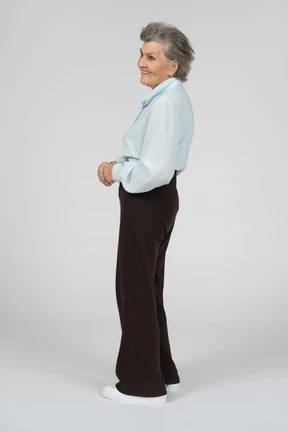 Side view of an old woman smiling to the left