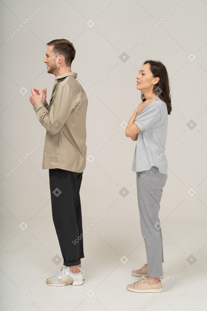 A man and woman looking at each other