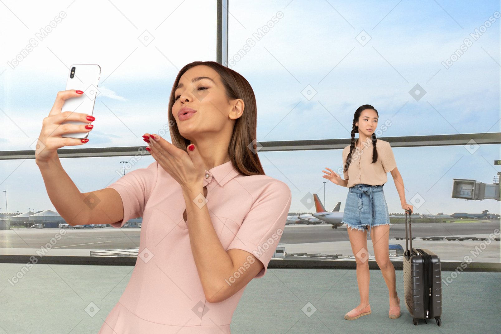 A woman taking selfies in an airport