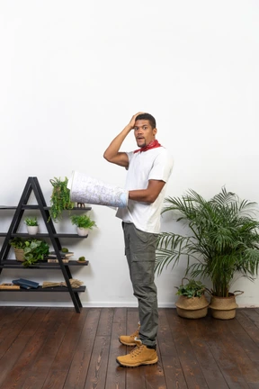 Good looking young man with a map