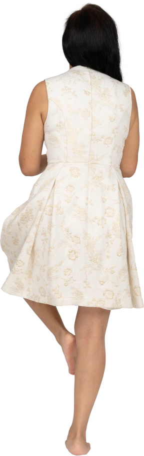 Woman in beautiful dress standing