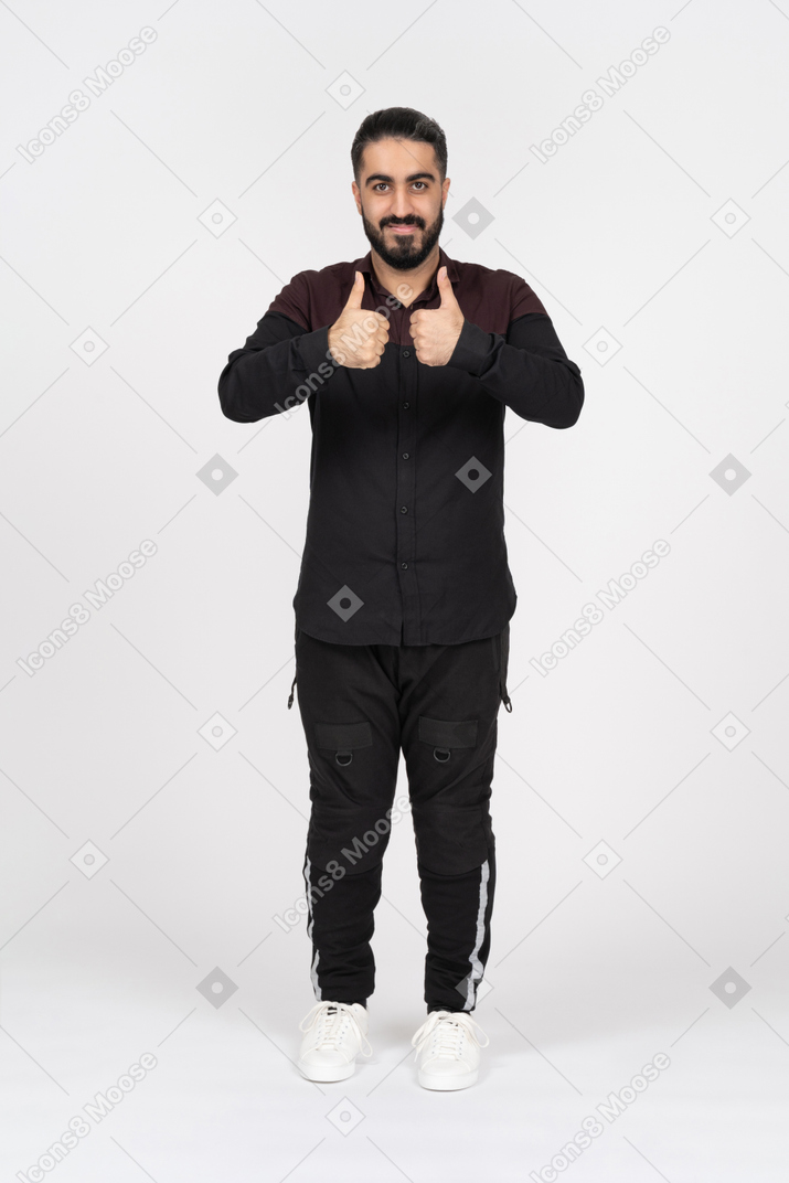 Man showing two thumbs up