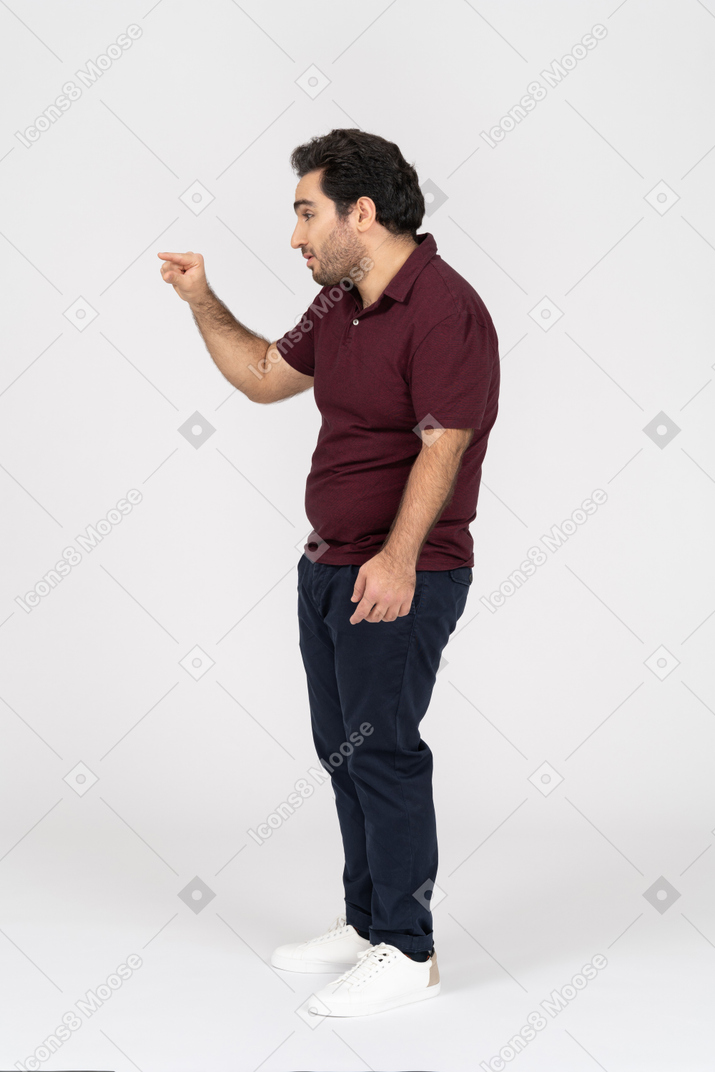 Side view of man showing size gesture