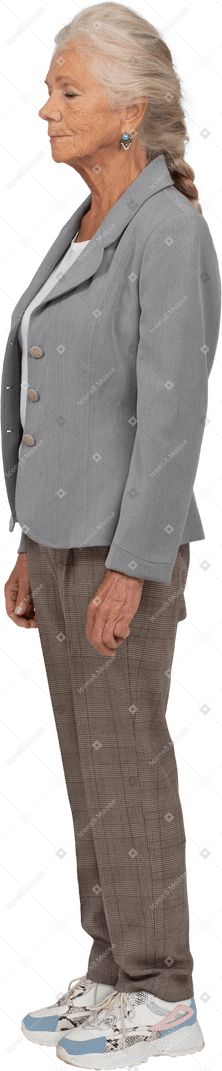 Old lady in suit posing in profile