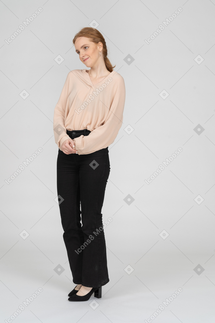 Woman in beautiful blouse standing