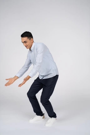 Man in casual clothes posing