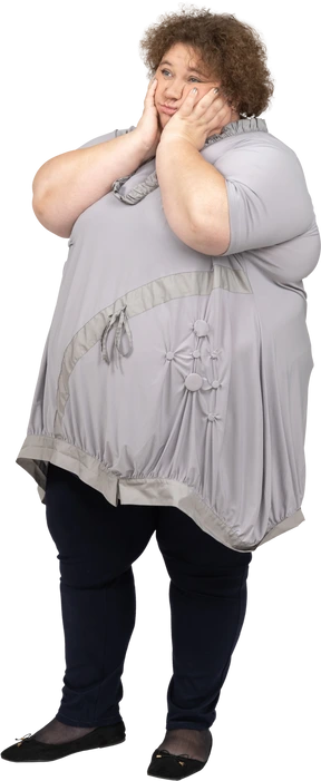 Woman with hands on her cheeks