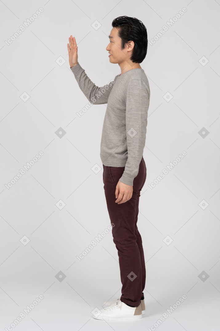 Man in casual clothes posing