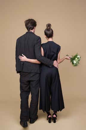 Back view of a young couple on their engagement day