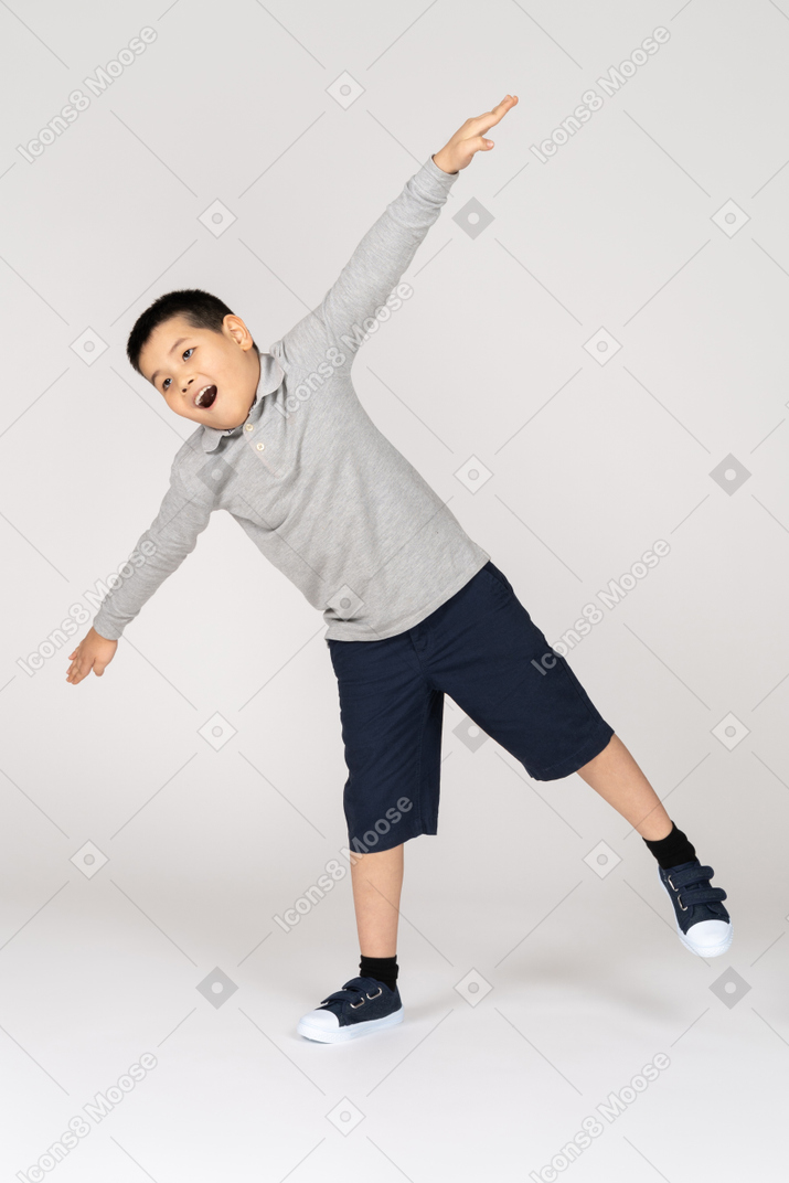 Little boy with spread arms