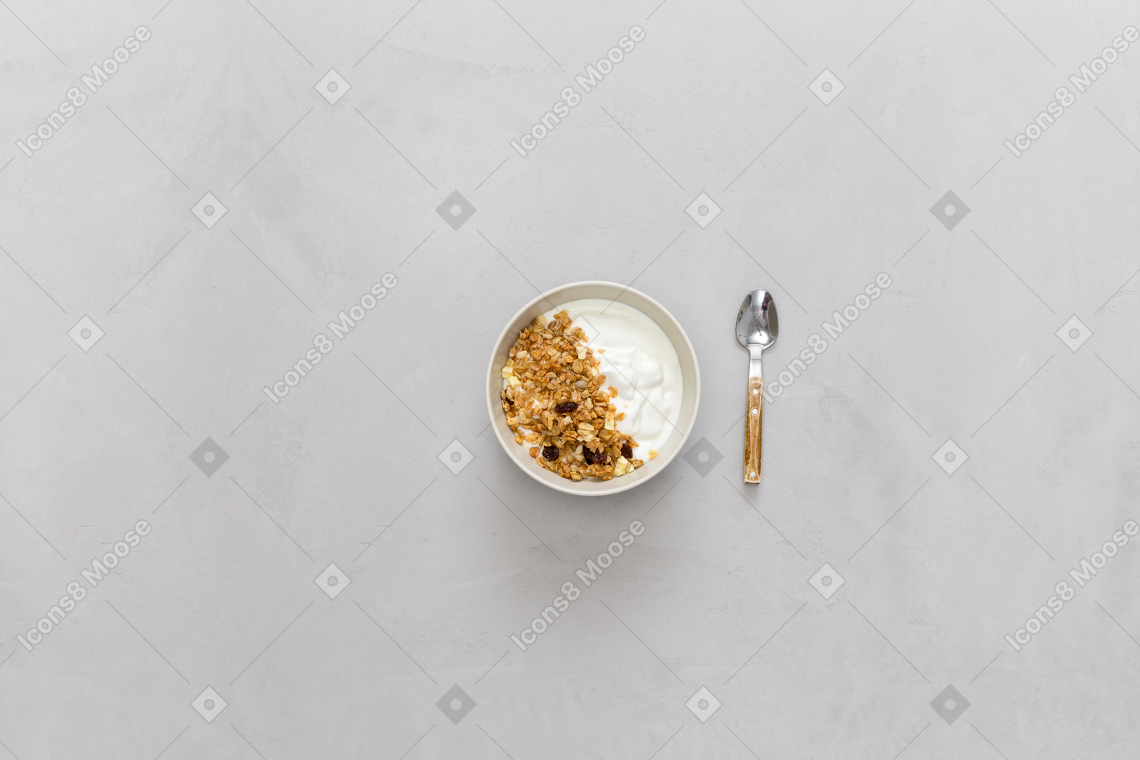 A bowl of cereals with yoghurt