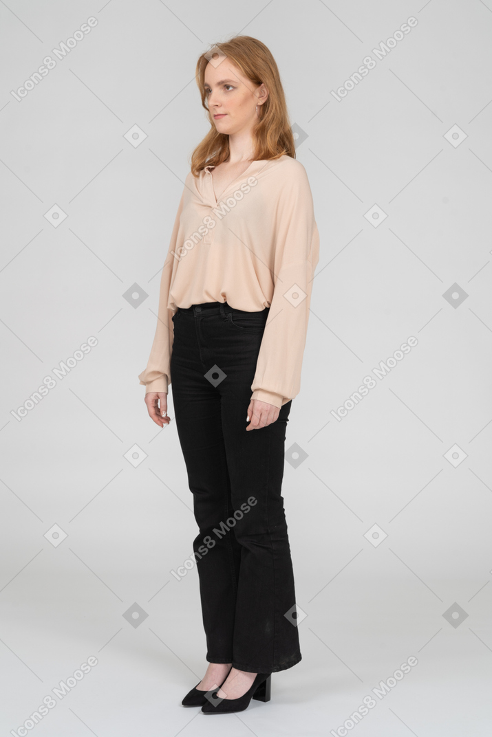 Woman in beautiful blouse standing